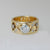 9ct yellow gold ring with white gold settings and various diamonds