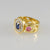 18ct yellow and white gold ring with diamonds blue sapphires and pink sapphires.