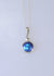 Long Koru bail pendant in silver with Eyris blue pearlwith 