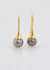 9ct yellow gold earrings. long drop shape. pearl cap with Cook island black pearls