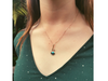 Blue pearl pendant on model