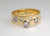 18ct yellow gold ring with white gold settings for the Diamonds