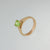 9ct red gold ring with checkerboard peridot