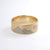 18ct yellow gold band ring with 18ct white gold inlay of mountains and sun design