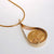 sovereign coin in 9ct yellow gold tear drop open pendant