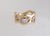9ct yellow gold ring with diamonds set in white gold settings