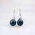 sterling silver drop earrings with Black pearls bought on holiday in the cook islands commission