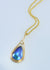 elegant 9ct yellow gold pendant with eyris blue pearl and a diamond