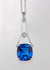 9ct white gold pendant with large blue stone and diamond.