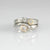 palladium wedding ring set with diamonds and yellow gold accents