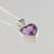 Aquamarine heart in 9ct white gold rub over set with diamond and yellow sapphire in the bail