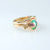 9ct rose gold wedding and engagement ring set. Wedding band has koru design and the engagement ring has A grade Eyris blue pearl set.