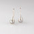 Sterling silver drop earrings with black pearls