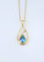 9ct yellow gold pendant with eyris blue pearl in a pear shape and a small diamond