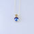 small 9ct yellow gold flower bail on Sterling silver setting with A grade Eyris blue pearl