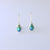 Sterling silver drop earrings with pear shape Eyris blue pearls.