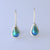 pear shaped drop earrings in sterling silver with pear shape Eyris blue pearls