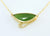 9ct yellow gold pendant with koru spiral design and greenstone/ Pounamu triangle cabochon