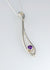 Sterling silver long open drop pendant with Amethyst set in rub over setting.