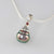 Sterling silver black pearl cap pendant with Ruby