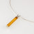 long narrow baguette cut citrine set in Sterling Silver frame on omega chain