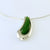 greenstone/ Pounamu long pear shape surrounded and moving freely between a sterling silver 'U' shape hanging on an omega chain 
