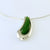 greenstone/ Pounamu long pear shape surrounded and moving freely between a sterling silver 'U' shape hanging on an omega chain