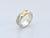 silver mens band ring with 9ct yellow gold mountain rang laid over the top of the band