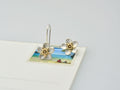 silver manuka flower drop earrings with 9ct yellow gold center with size sample