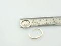 handmade silver hoops on ruler