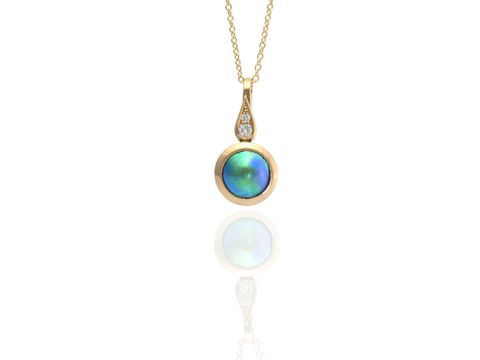 Rose gold pendant with Blue pearl and diamonds